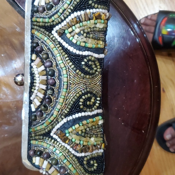 This is a nice beaded clutch just some beads missing on one side ,not notice - Picture 2 of 7